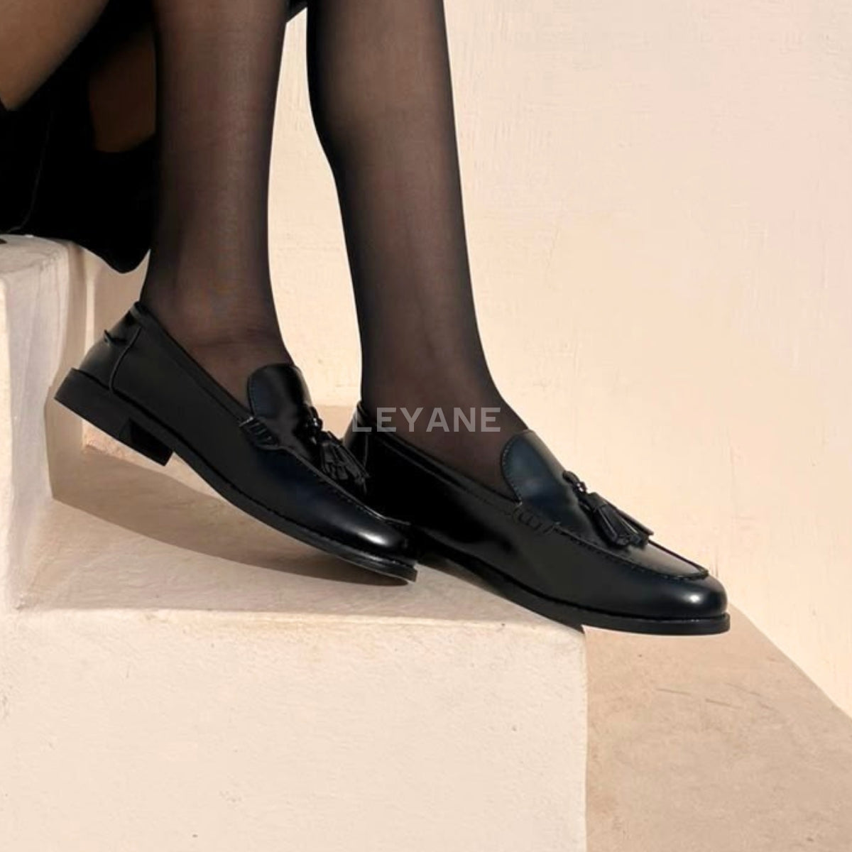 Mocassins à pompons - Noir