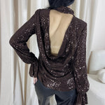 top soirée, top sequin, top dos nu, top évènement, top en ligne, top femme, top chic, top élégant, top tendance, top noir, top marron, top blanc, top brillant, top court, top long, top habillé, top glamour, top party, top fashion, top en ligne maroc, top femme maroc, top leyane, top leyane maroc, top marrakech, top casablanca, top rabat, top fes, top tanger, top agadir, outfit soirée, outfit chic, outfit for a date,