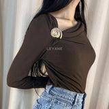 top femme, top soirée, top à sequins, top dos nu, top événement, top habillé, top chic, top élégant, top tendance, top en ligne, top noir, top marron, top brillant, top glamour, top court, top long, top ajusté, top moderne, top fashion, top party, top femme maroc, top maroc, top leyane, top leyane maroc, top marrakech, top casablanca, top rabat, top fes, top tanger, top agadir, outfit femme, outfit soirée, outfit chic, outfit for a date, ootd
