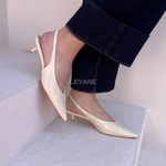 mules femme, chaussures femme, talon bas, bout pointu, slingback, mules élégantes, chaussures chic, mode femme, collection chaussures, couleurs variées, minimaliste, tendance mode, chaussures modernes, style sophistiqué, look bureau, chaussures confortables, fashion femme, été printemps, chaussures ouvertes, design épuré