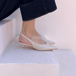 mules femme, chaussures femme, talon bas, bout pointu, slingback, mules élégantes, chaussures chic, mode femme, collection chaussures, couleurs variées, minimaliste, tendance mode, chaussures modernes, style sophistiqué, look bureau, chaussures confortables, fashion femme, été printemps, chaussures ouvertes, design épuré