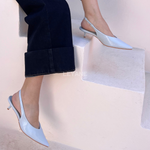 mules femme, chaussures femme, talon bas, bout pointu, slingback, mules élégantes, chaussures chic, mode femme, collection chaussures, couleurs variées, minimaliste, tendance mode, chaussures modernes, style sophistiqué, look bureau, chaussures confortables, fashion femme, été printemps, chaussures ouvertes, design épuré